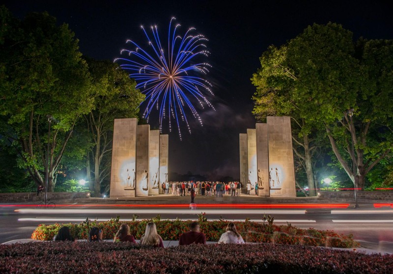 This image represents the Ring Reveal firework show as it is seen from spectators at the Chapel.