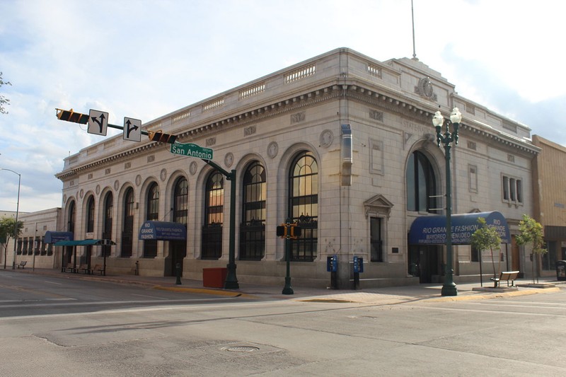 The old State National Bank building was erected in 1922 and continues to symbolize the city's rapid growth during the early 20th century.