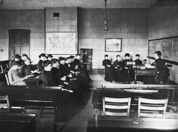 Image of a classroom at the school, circa late 1800s. 