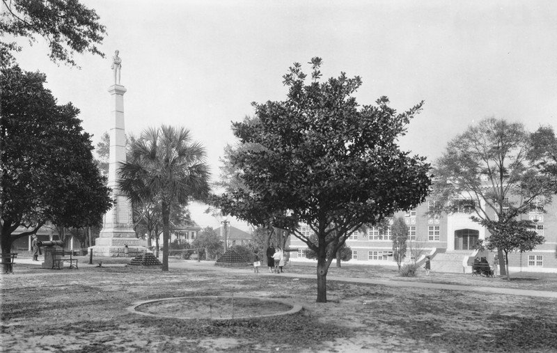 800 cannonballs and two old cannons sit infront of monument