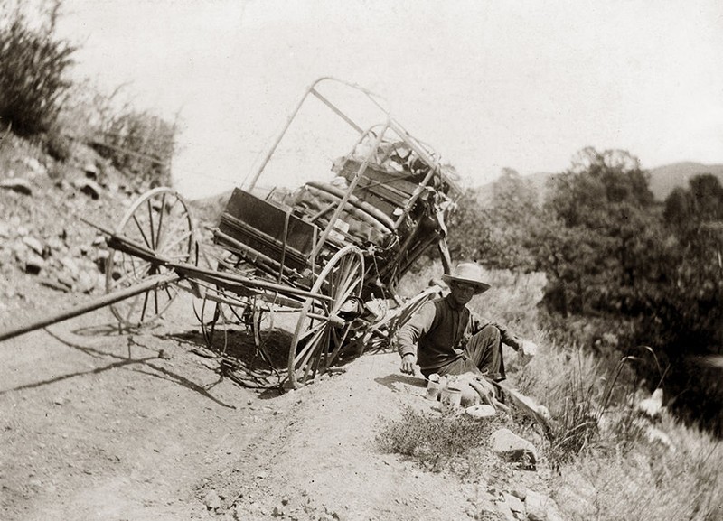 A photograph of the disabled wagon that brought Blumenschein to Taos. That's Bert Phillips with the wagon.