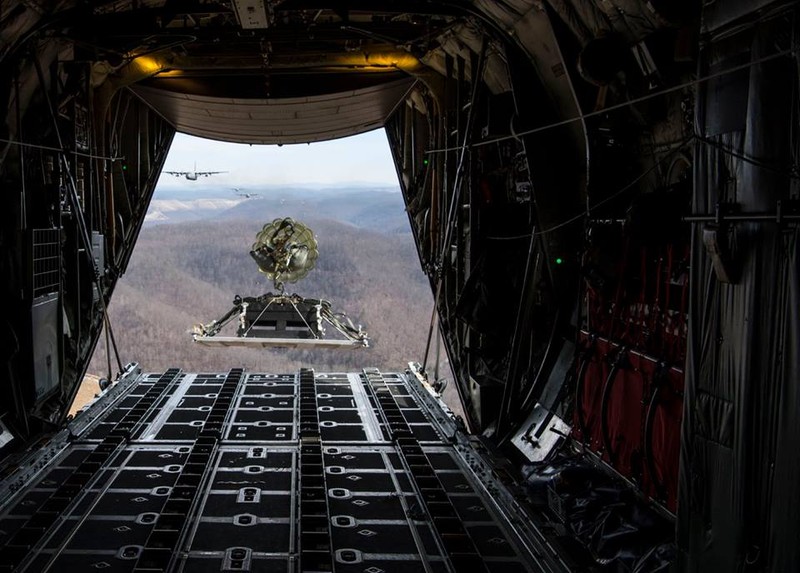 C-130H assigned to the 130th Airlift Wing, McLaughlin Air National Guard Base, Charleston, W.Va. drops cargo during a low altitude airdrop flying mission over Fola, WV. Feb. 4, 2017. Fola provides aircrew members with experience in low altitude airdrops. (U.S. Air National Guard photo by Tech. Sgt. De-Juan Haley)