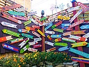 The Multi-Lingual Welcome Sign Mural at Randyland