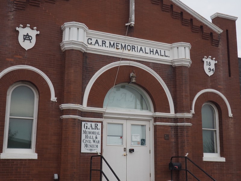Front facade of hall. White trim is featured quite extensively throughout.