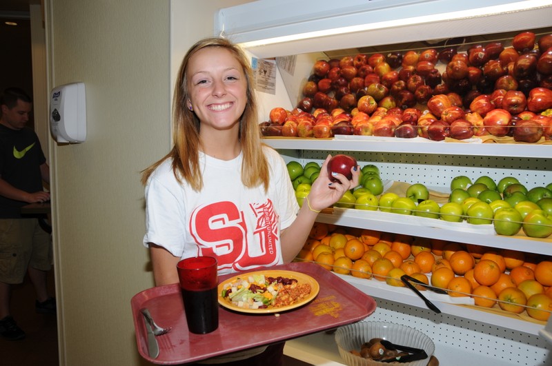 Student getting fruit in the Dining Hall