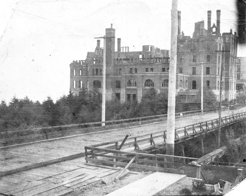 Old Tacoma Tourist Hotel being rebuilt into Stadium High School, circa 1904