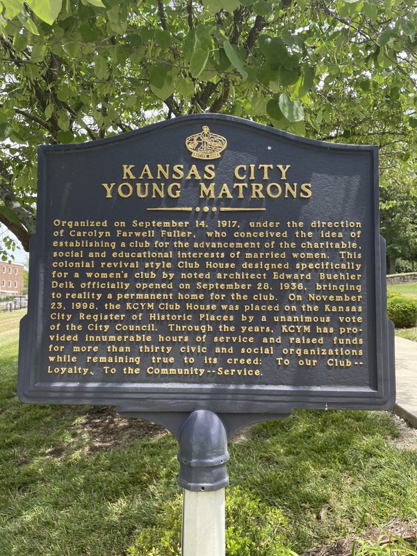 This historical marker is located next to the headquarters along Cherry Street .