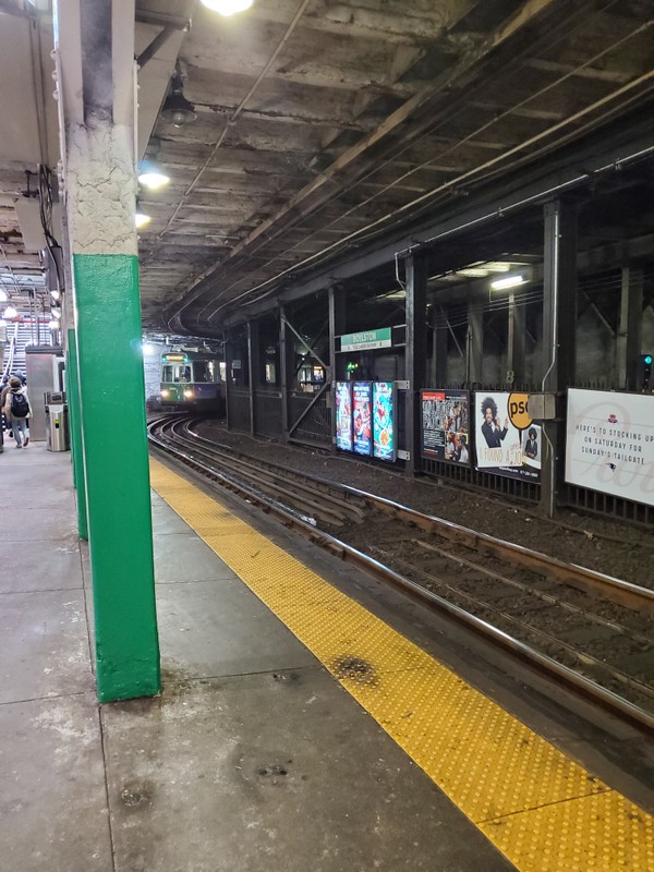 A train entering the inbound station around the sharp turn