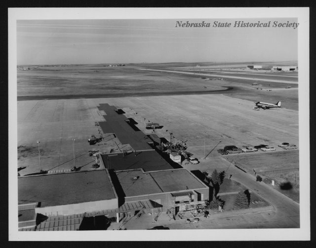 Black-and-white aerial view of Lincoln's general aviation building around 1963. 