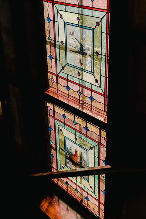 Image 3, Stained Glass as you are walking up the stairs 