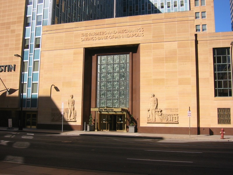 The F&M entrance, now the Westin Hotel entrance, includes carvings depicting farmers and workers. 
