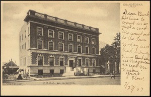 A postcard showing the 1904 YMCA building, consisting of an imposing three-story brick building.