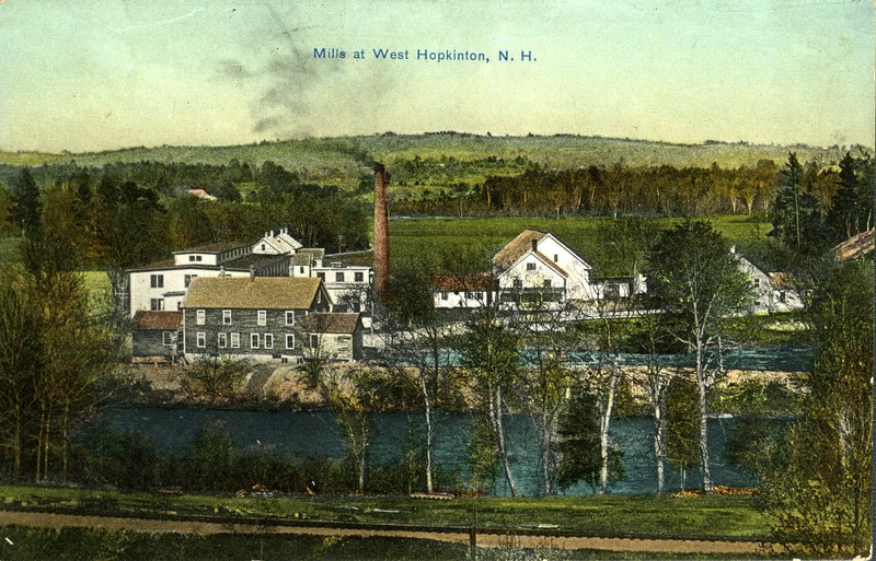 An early 20th-century postcard with a colorized photo of the mills at West Hopkinton.  Visible in the foreground are the railroad tracks that delivered fuel to the facility.   