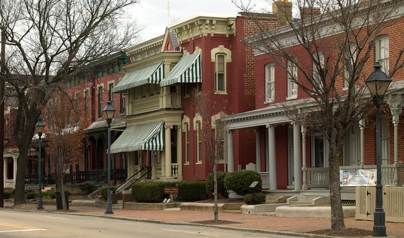 Walker's home is on the right, and was part of a neighborhood known as "Quality Row" owing to the reputation of its families.