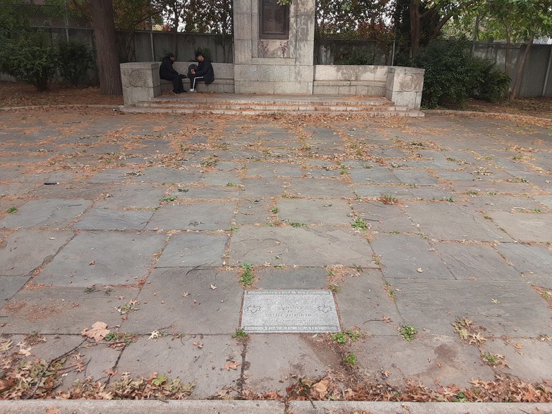 Memorial captured with stone plaque.