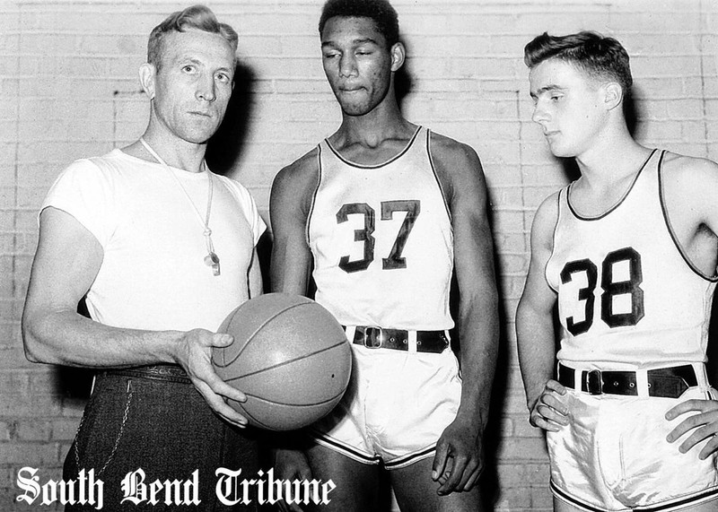 Coach John Wooden with players Parson Howell and Wayne Thompson