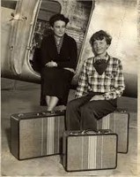 Helen Richey (left) sitting next to co-pilot and good friend Amelia Earhart (right) prior to their flight together.