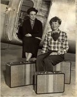 Helen Richey (left) sitting next to co-pilot and good friend Amelia Earhart (right) prior to their flight together.