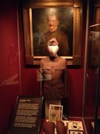 A soldier's uniform from war on display in the Military Museum