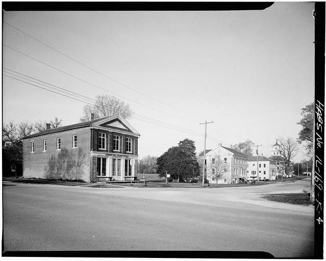 The Colony Store in 1933 with a view of the Administrative buildings and hotel in the background.