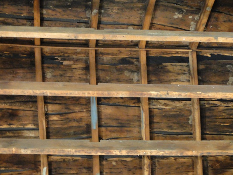 The structure's original roof is still intact and visible in the Sitting Room today.