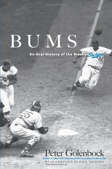 Peter Golenblock, Bums: An Oral History of the Brooklyn Dodgers. On the cover, Jackie Robinson steals home against the Boston Braves on Aug. 22, 1948 at Ebbets Field.