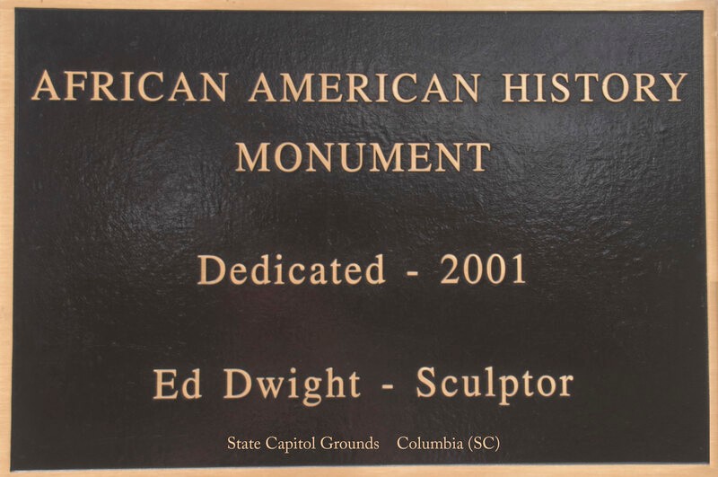 Plaque on the front of the monument.