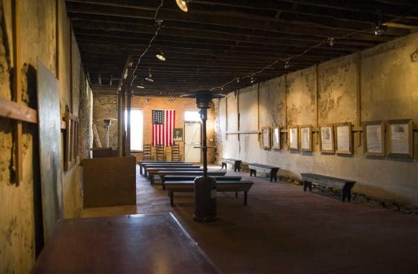 Despite extensive damage owing to years of neglect, the interior of the historic building is now open and used for school tours and other events. 