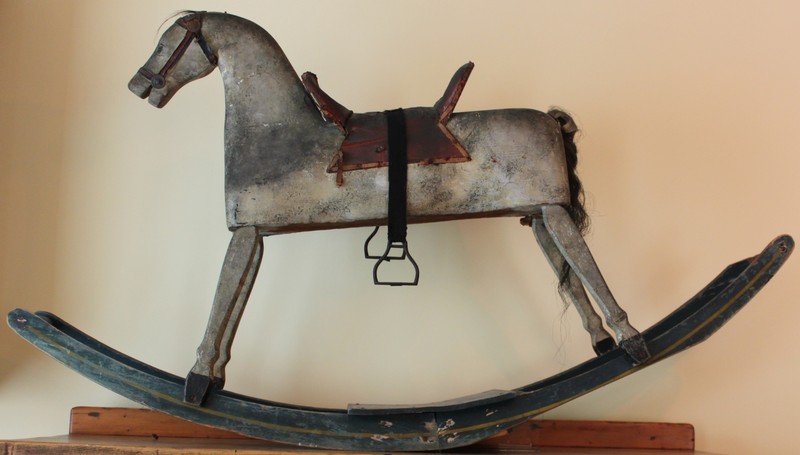 Painted wood rocking horse with hair tail