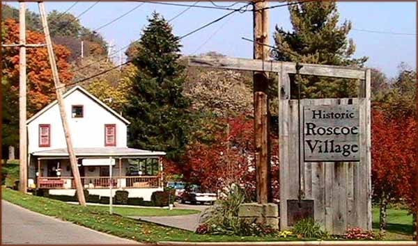 A modern photo of the welcome sign to the Roscoe Village. 