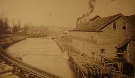 An old photo depicting the Reedy River Industrial complex in the mid 1800s.