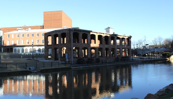 Another modern photo of the former industrial complex that exemplifies its' size and location among the Reedy River. 