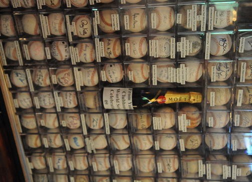 Autographed baseball wall.