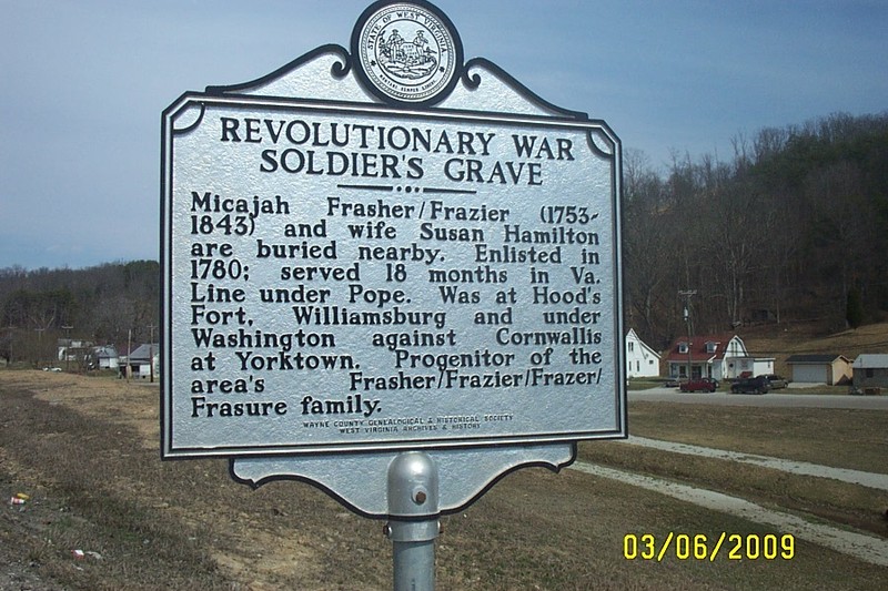 Historical marker near grave.