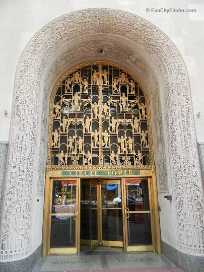 Circle Tower's Market Street entrance features a 1.5 story carved arch, hieroglyphic-like images and a revolving door.
