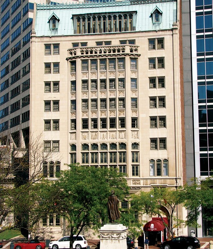 The Gothic Revival Columbia Club building features a six-story oriel window.