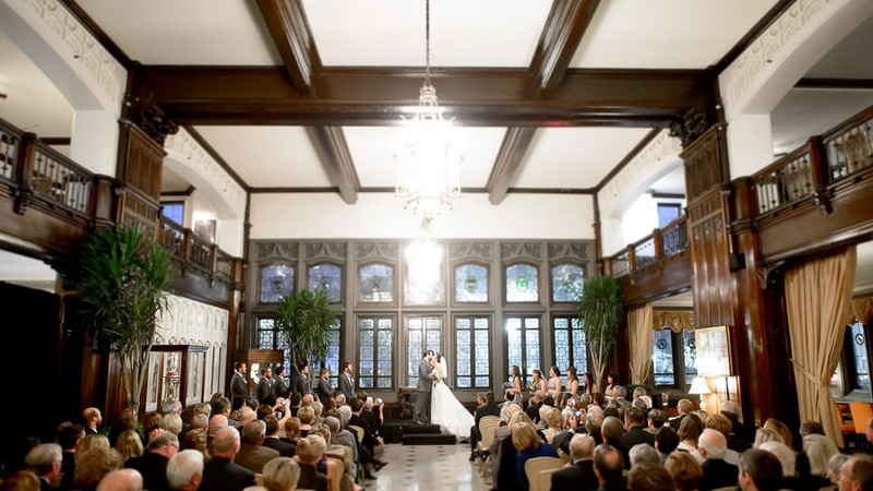 A happy couple is joined in matrimony at the Columbia Club.  