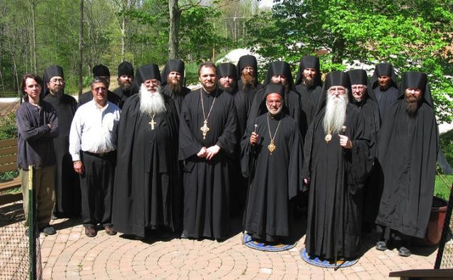 Bishop Thomas and Father John with the Holy Cross Monastery Monks 