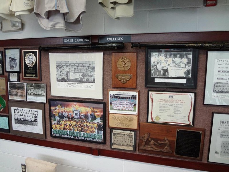 Historic Fleming Stadium Clubhouse Lockers complete with era uniforms, caps and equipment.