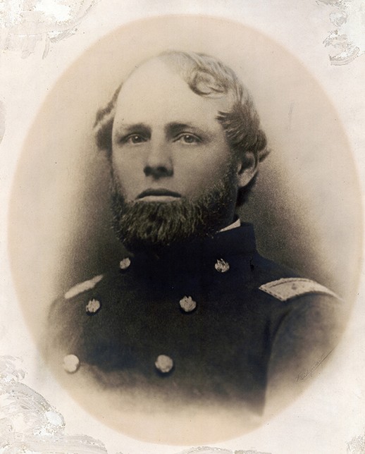 Bust portrait photograph of Cassius Fairchild. He is shown wearing a double-breasted officer's coat with shoulder straps.