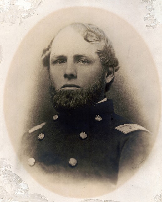 Bust portrait photograph of Cassius Fairchild. He is shown wearing a double-breasted officer's coat with shoulder straps. 