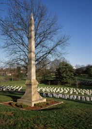 The oldest burial sections, the wedge-shaped Sections A through H, surround Monument Circle, a pathway which loops around a section of officers’ graves and a granite obelisk marking the grave of Congressman Brownlow and his wife, Clayetta. 