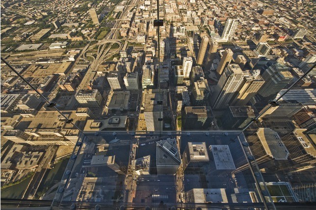 View from the Ledge - four glass boxes that extend 4.3 feet (1.3 metres) from the building, 1,353 feet above the ground. 