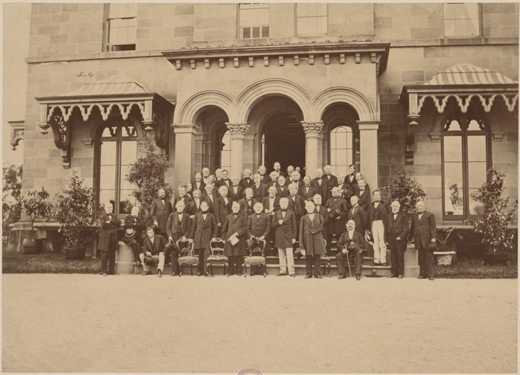 Photograph taken June 10 1869 of Society members standing on the front steps of Society President R.C. Winthrop's house in Brookline (Courtesy Massachusetts Historical Society)