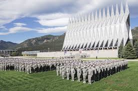 Cadets stand in formation next to the Cadet Chapel, which is one of most visited sites in Colorado.