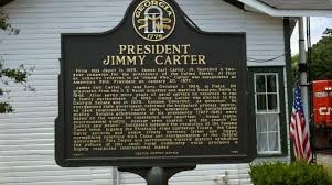 A sign commemorating what was once President Jimmy Carter's first campaign headquarters