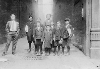 Newspaper delivery boys standing in Printer's Alley. Courtesy of "Library of Congress Archives Nashville Tennessee Collection.