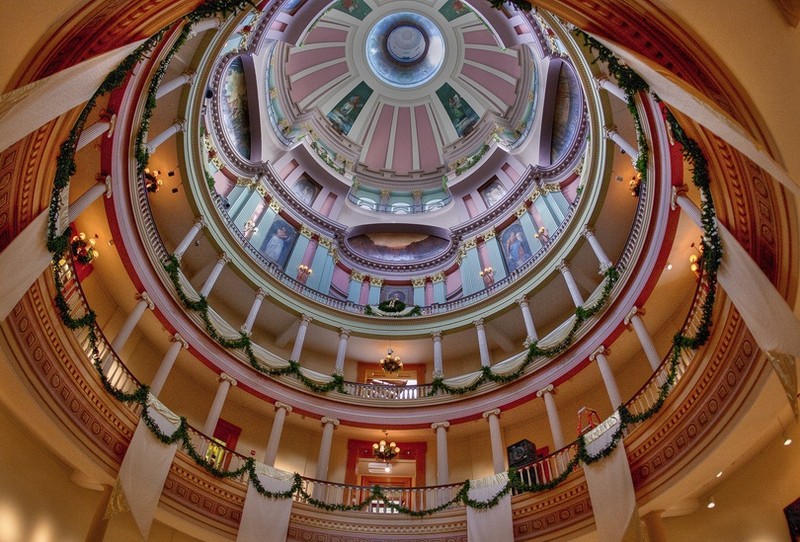 Central rotunda surmounted by a Renaissance style cast-iron dome and lantern. 