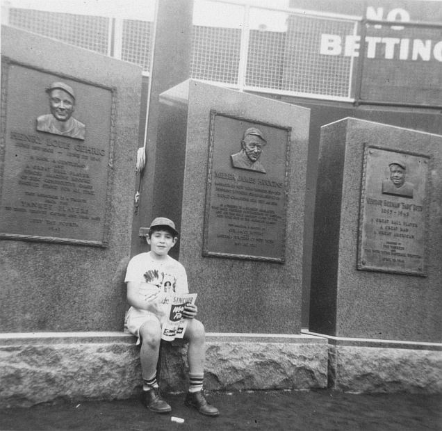 Young boy visiting the monuments located in center field of Yankee Stadium, 1951. 