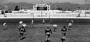 View of Gilmore Stadium scoreboard. Scene from a Three Stooges movie. Three Little Pigskins.